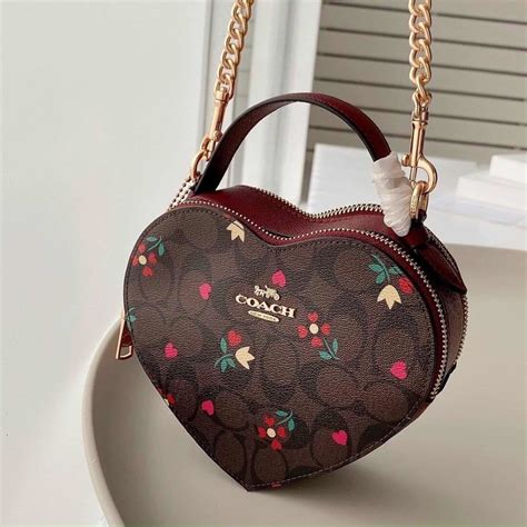 carteras coach corazon